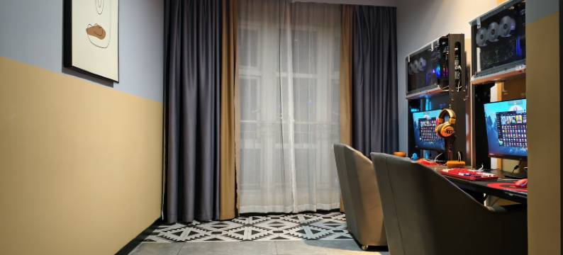 TK·星游电竞民宿(玉林金城中心十字街店)图片