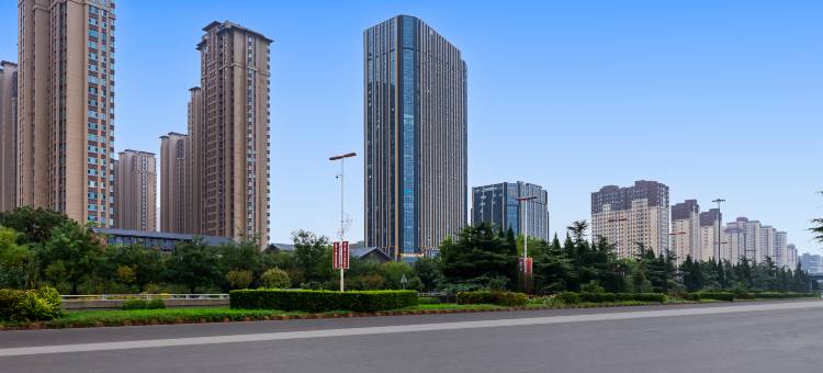 万漫酒店(中心城彩虹国际店)图片