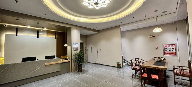 禧岸欢娱酒店(潢川西亚和悦广场店)图片