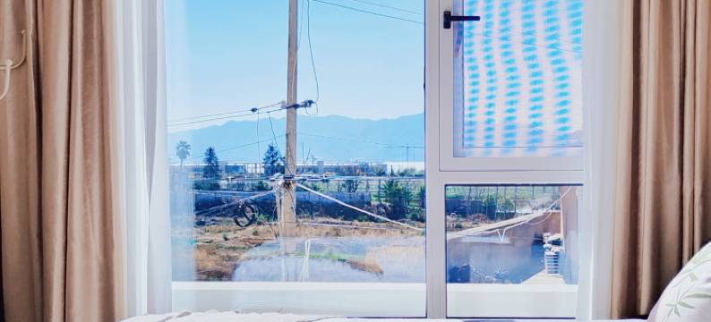 媛玺民宿(月亮湾湿地公园店)图片