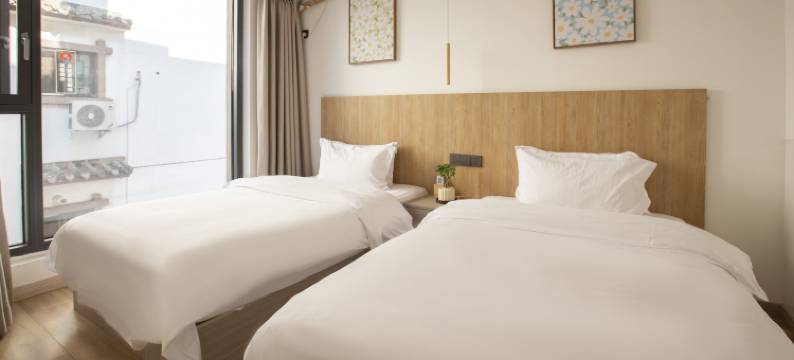 月光栖客栈(邛海湿地店)图片