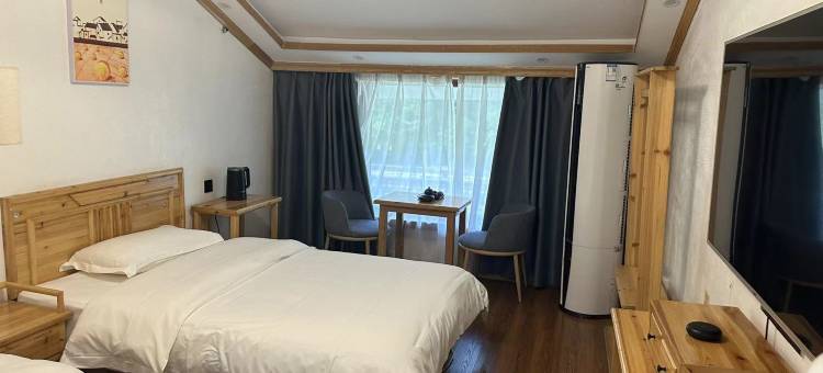 凤凰花锦时客栈图片