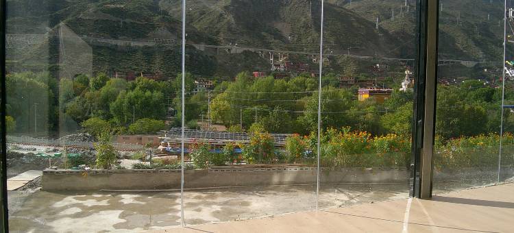 巴塘开源酒店图片