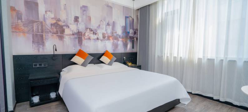 泗水悦客酒店(中兴路店)图片