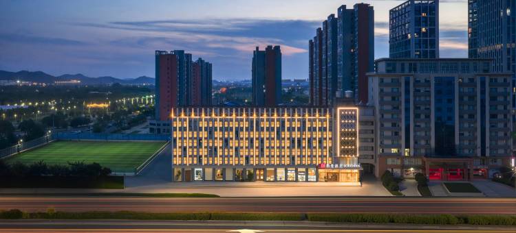 柏曼酒店(武汉永旺梦乐城江夏客厅地铁站店)图片