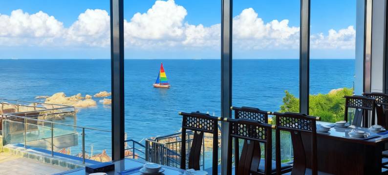 亿腾海景日出酒店(北戴河鸽子窝碧螺塔店)图片