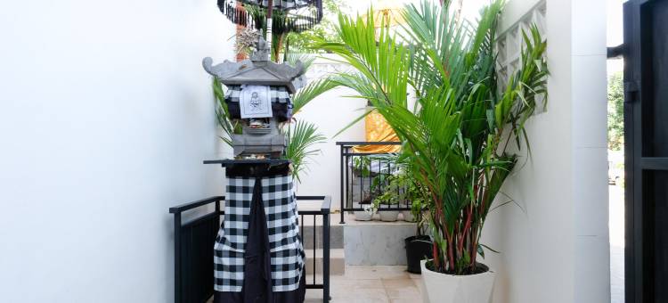 Urbanview Hotel Arta Guna Casa图片