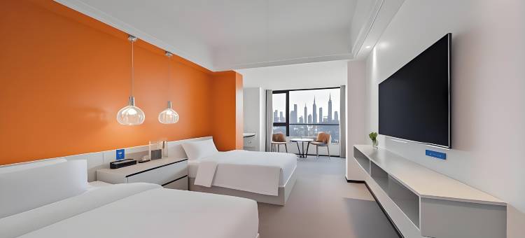 古德奈特酒店(汽博中心金渝地铁站店)图片