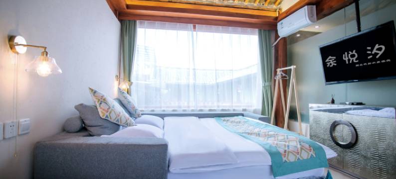 丽江余悦汐雪山花园水景客栈(束河古镇店)图片