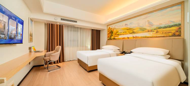 维也纳国际酒店(湛江保利原点广场渔人码头店)图片