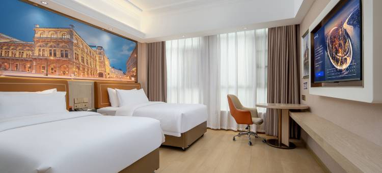 维也纳酒店(盘州南湖公园银杏广场店)图片