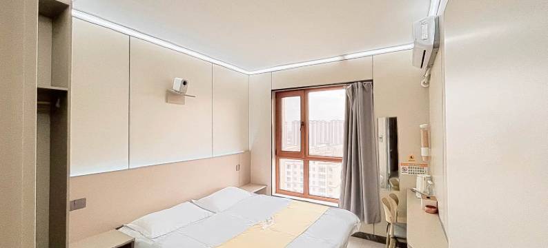 拾意·智能观影·深睡床枕·休闲度假民宿(江北大学城店)图片