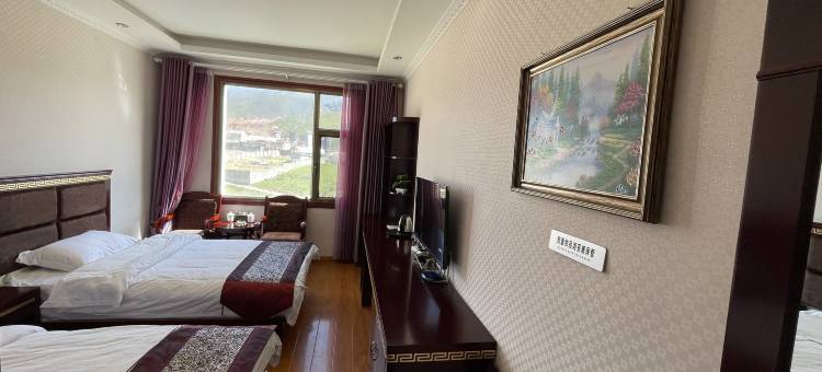 碌曲郎木寺龙福宾馆图片