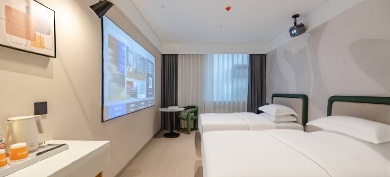 城小橙·AI智慧民宿(咸宁火车站店)图片