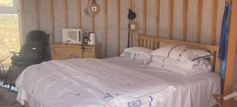 火山草原查干敖包度假营图片