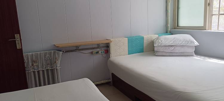 青岛环新城旅馆图片