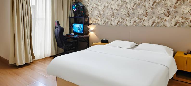 竞放电竞酒店(广州花都狮岭皮革城店)图片