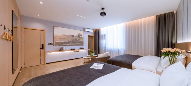 小鹿辰客·晗洣智能影视酒店(大理大学第一附属医院店)图片