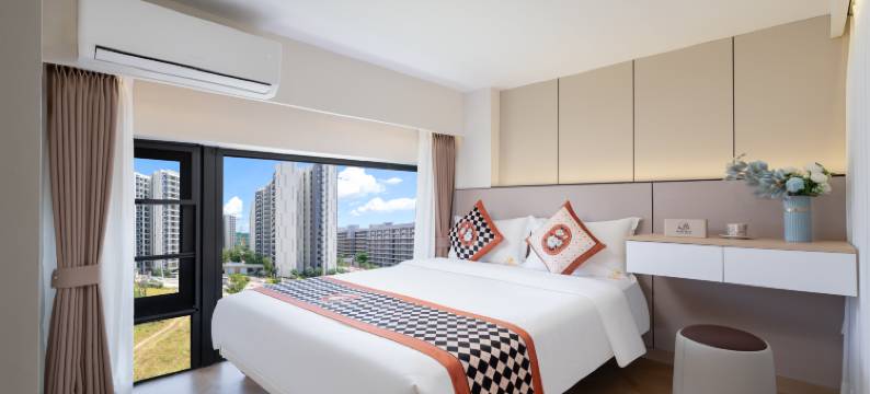 椰子宿下·听蓝·LOFT设计城市艺宿(三亚湾凤凰机场店)图片