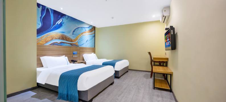 兰丽百合E Hotel(阳江汽车总站君怡广场店)图片