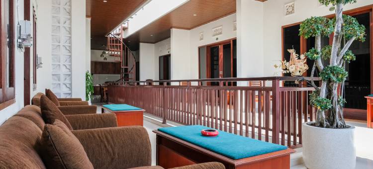 Urbanview Hotel Arta Guna Casa图片