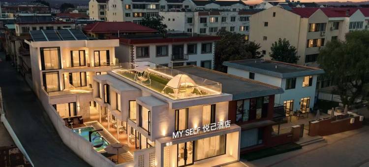 北戴河悦己酒店(石塘路步行街店)图片