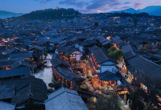 Panoramic view of the ancient city by the mountain stream (Lijiang Sifang Street) over view