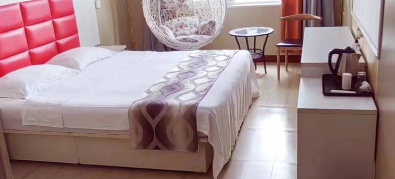 新郑阳光商务宾馆(高坡岩郑州经贸学院店)图片