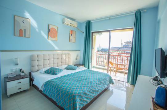 西双版纳七间房酒店(告庄星光夜市店)