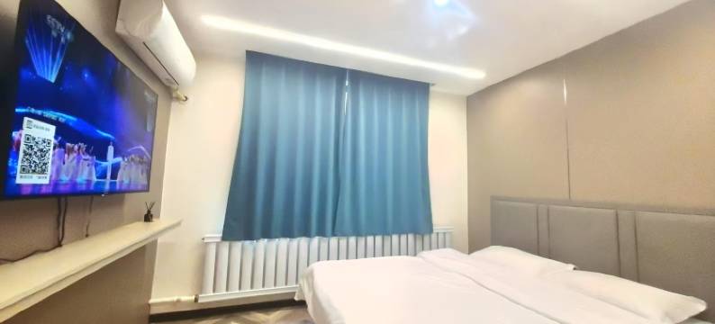 禾悦小住轻奢公寓(万达广场店)图片