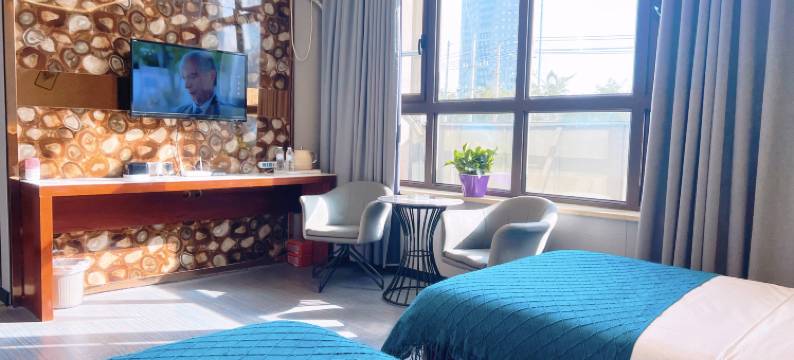 库尔勒宝家精品酒店(孔雀河店)图片