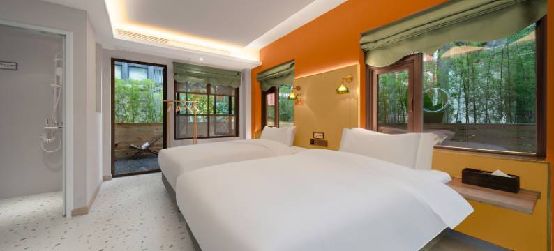 芊芊芒果树酒店(乐山大佛东大街美食街店)图片