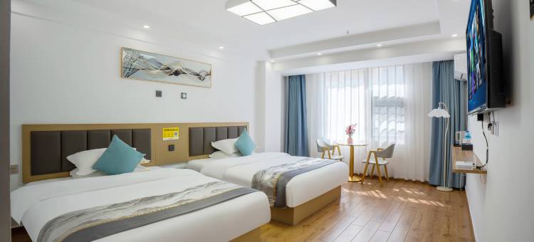 禄劝盛夏名都酒店图片