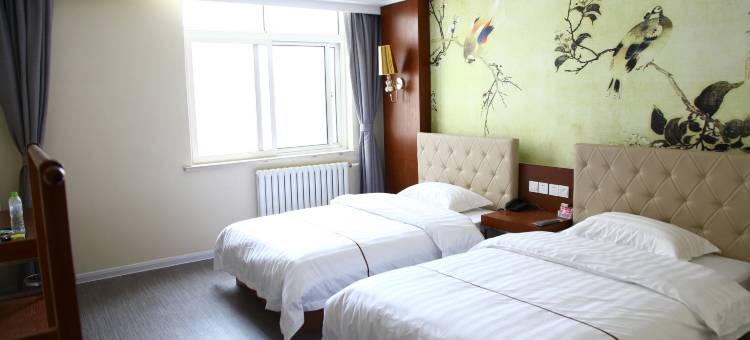 东海岸宾馆(青岛火车站团岛地铁站店)图片