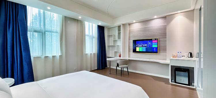 庐扉x酒店(郑州市中牟县天泽城轻工业大学易斯顿美术学院店)图片