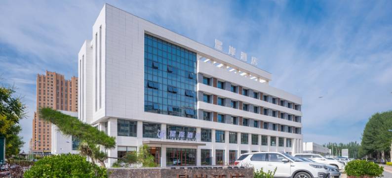 中卫星岸酒店(沙坡头区鼓楼西街店)图片