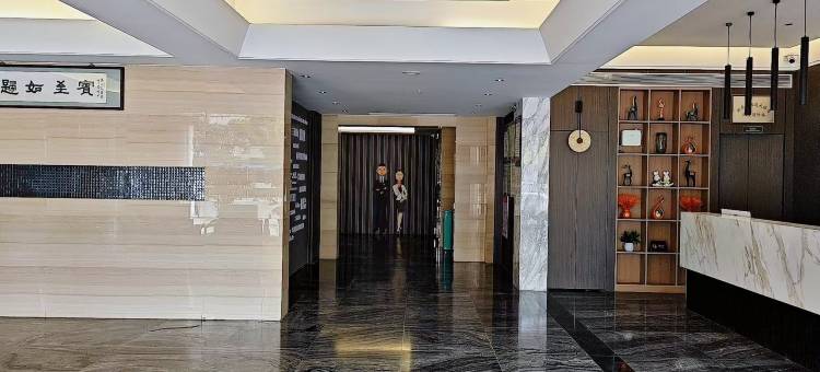 白玉兰商务酒店(黄冈浠水闻一多大道店)图片