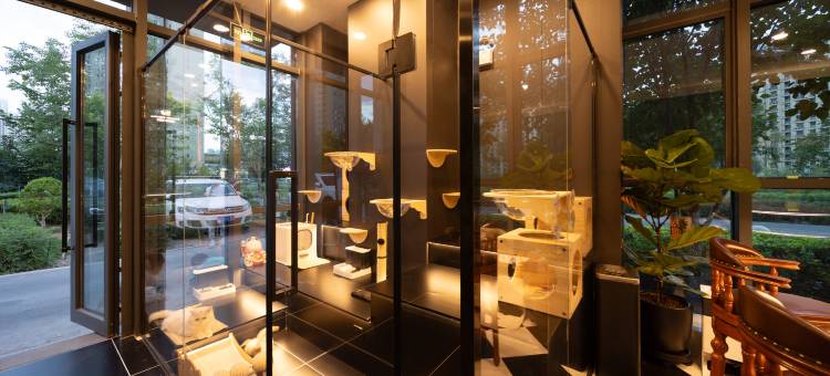 久居可漫咖酒店(乌鲁木齐高铁站店)图片