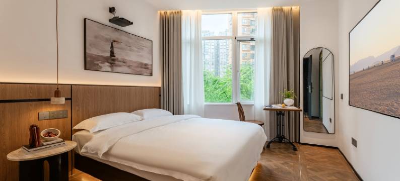 成都喜乐·影院酒店(华侨城欢乐谷西南交通大学九里校区店)图片