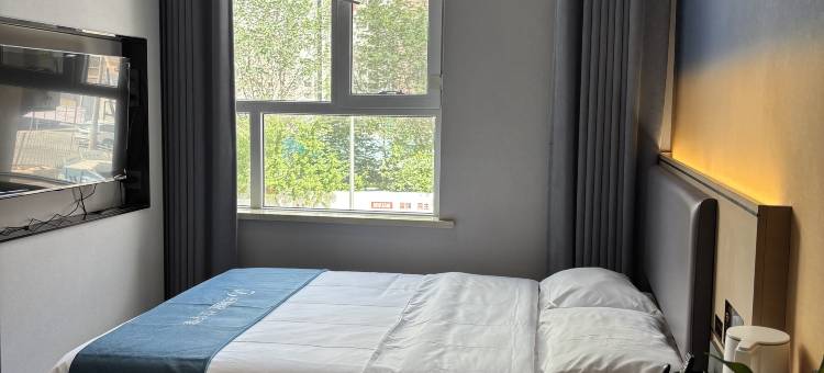 如家UP华驿智旅酒店(哈密伊州区雅合大厦店)图片