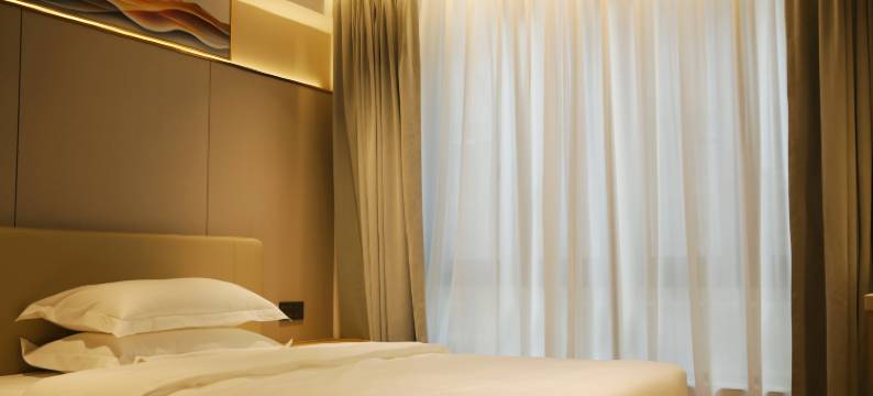 花漾舒适酒店(九曲湾温泉首创奥特莱斯店)图片