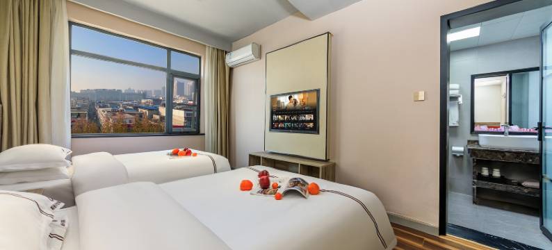 斯丽卡尔精品酒店(一峰城市广场步行街店)图片