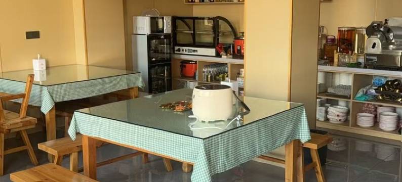 临江春枫里宾馆图片