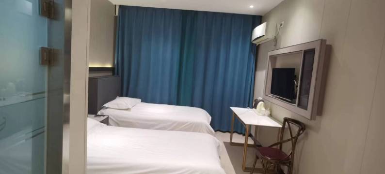 宜世宜嘉主题宾馆公寓(齐齐哈尔站前南大街店)图片