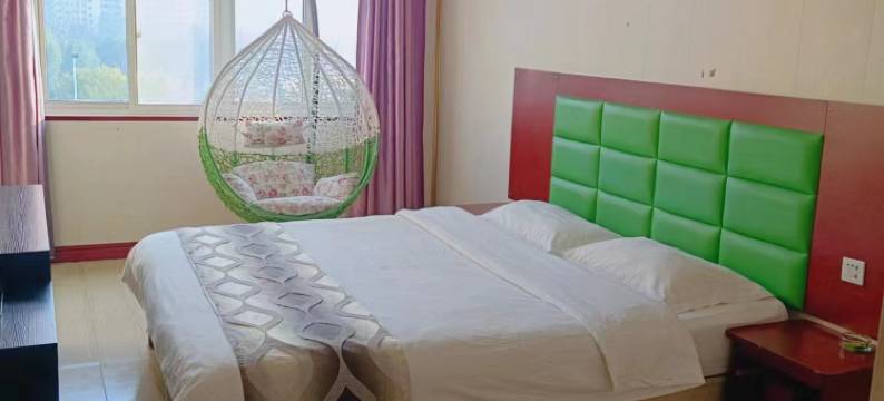 新郑阳光商务宾馆(高坡岩郑州经贸学院店)图片