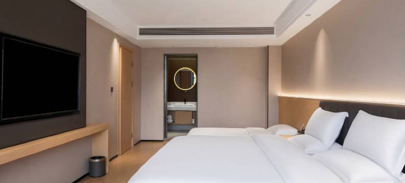 大浪淘沙酒店(盘州东湖公园合力广场店)图片