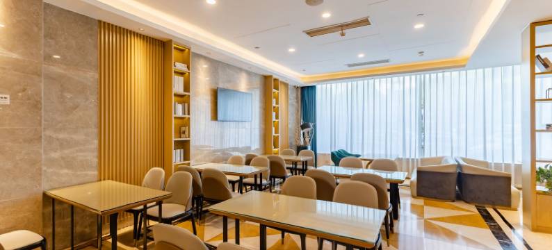 苹果淳源酒店(元一名城火车站店)图片