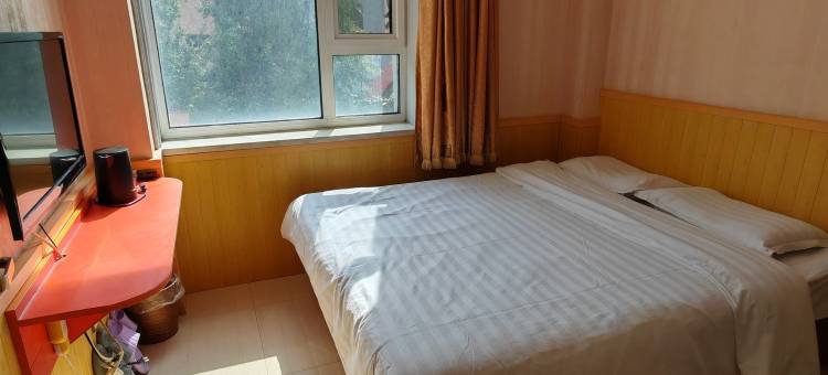 吉林爱家时尚宾馆(九站农校科技学院店)图片