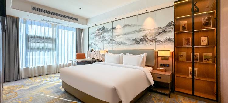 万江国际酒店(化隆店)图片