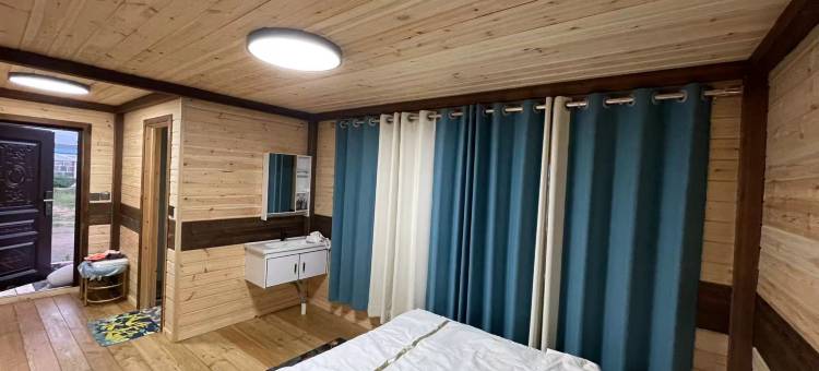 额尔古纳奥列格木屋民宿图片